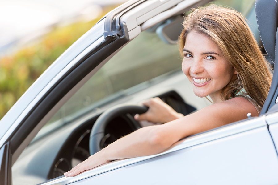 bigstock-Beautiful-woman-driving-a-car--44998648