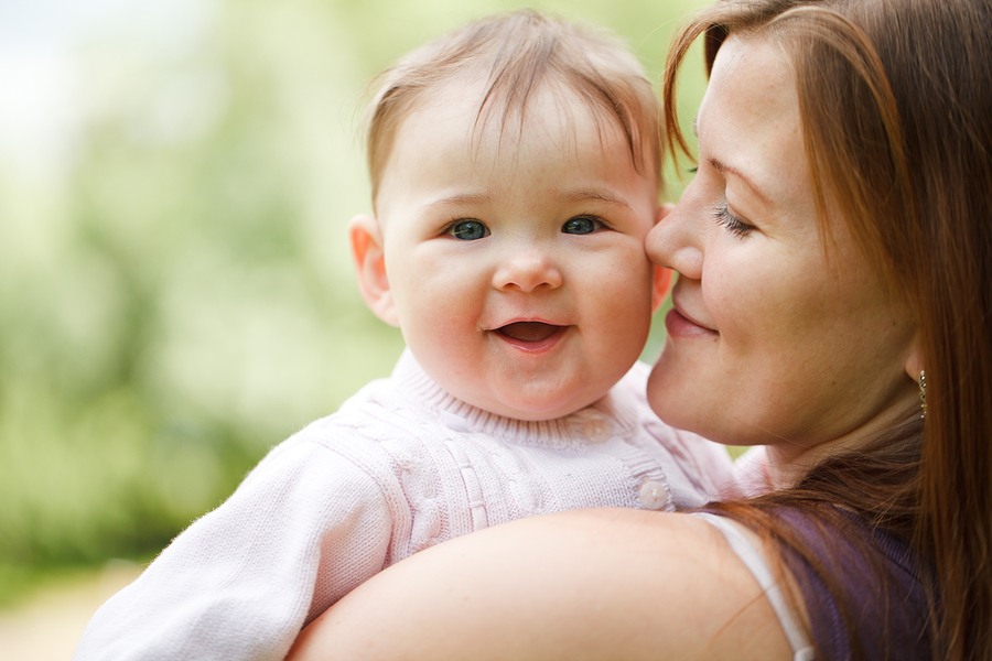 bigstock-Mother-with-baby-at-outdoors-26599679